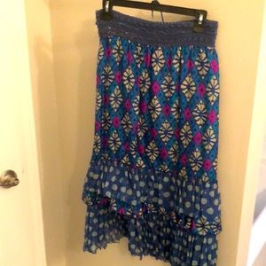 Blue skirt w/ruffles at the bottom with pink printed silk diamond shape design